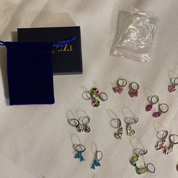 12 pairs earrings for little girls.  See dimes for size reference.  NEW - Picture 2 of 7